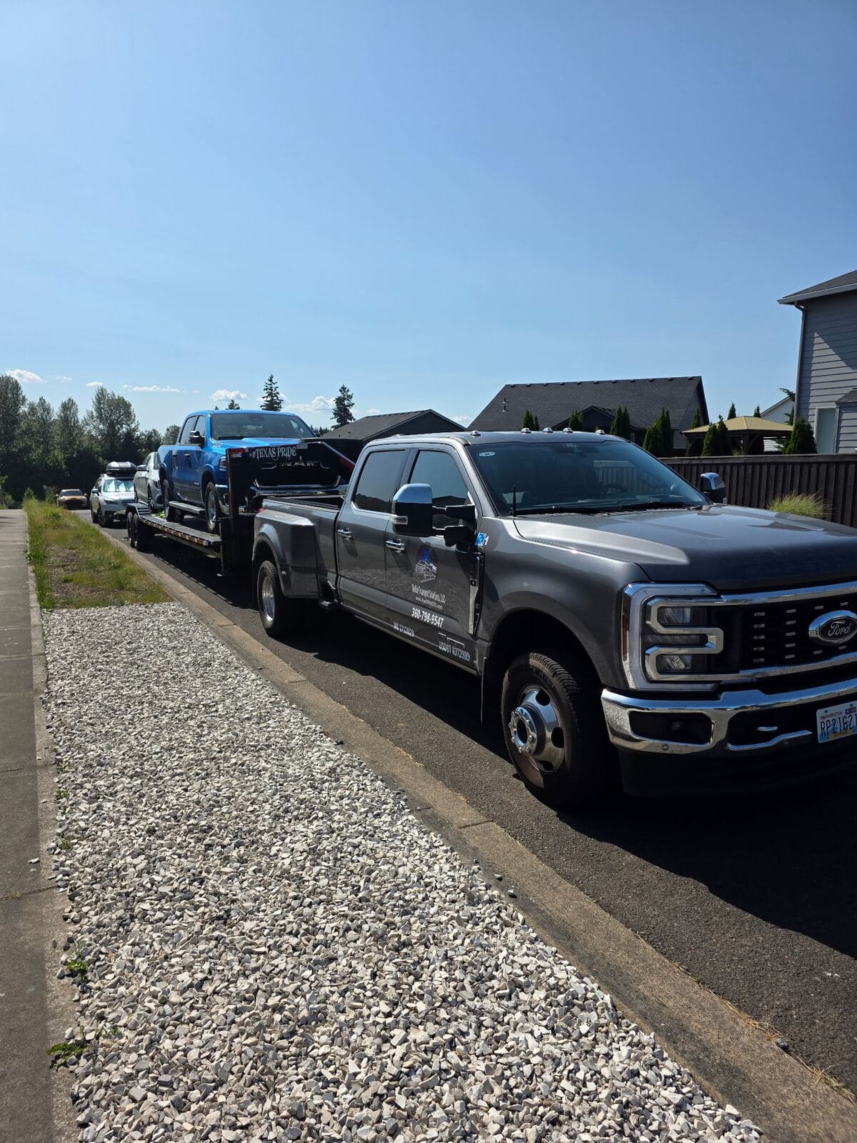 Two-vehicle haul, secured with over-the-wheel 3-point straps